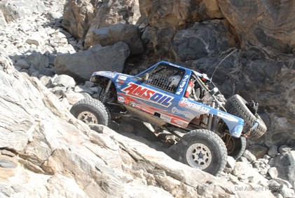 AMSOIL Premium Synthetic Lubricants protect Off Road Trucks 