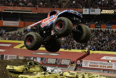 Jumping Over Cars in AMSOIL Shock Therapy Monster Truck